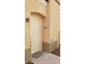 Inviting front door with unit number 201 and modern lighting fixture enhancing the exterior appeal at 6316 Beige Bluff St # 201, North Las Vegas, NV 89081