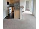 Cozy kitchen features modern appliances and wood cabinets at 6316 Beige Bluff St # 201, North Las Vegas, NV 89081