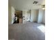 Bright living room with carpet and a view of kitchen at 6316 Beige Bluff St # 201, North Las Vegas, NV 89081