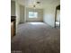 Open-concept living area offering natural light and seamless flow to the outdoors at 6316 Beige Bluff St # 201, North Las Vegas, NV 89081