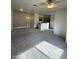 Living area with open floor plan, ceiling fan and carpeted floor enhances space and comfort at 6316 Beige Bluff St # 201, North Las Vegas, NV 89081
