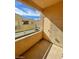 Outdoor patio area showcasing the residential unit with a wall-mounted storage space at 6316 Beige Bluff St # 201, North Las Vegas, NV 89081
