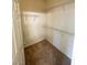 Spacious walk-in closet with metal shelving for ample storage and neutral carpet at 6316 Beige Bluff St # 201, North Las Vegas, NV 89081