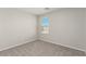 Bright bedroom with neutral walls, carpet flooring and a window at 6443 Burlap Ct, Las Vegas, NV 89122