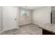 The entryway features tile flooring and a large window at 6443 Burlap Ct, Las Vegas, NV 89122