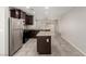 Modern kitchen with stainless steel appliances, granite countertops, and center island at 6443 Burlap Ct, Las Vegas, NV 89122