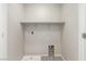 Laundry room with hookups, utility sink and neutral walls at 6443 Burlap Ct, Las Vegas, NV 89122