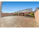 Spacious backyard featuring a gazebo, brick pavers, and string lights at 6618 Tangled Vines Ave, Las Vegas, NV 89139