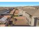 A fenced backyard features a patio, a covered patio, and well-kept landscaping at 6618 Tangled Vines Ave, Las Vegas, NV 89139