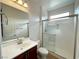 Bathroom featuring a glass shower door, sink, and vanity at 6946 Motley Rd, Las Vegas, NV 89178