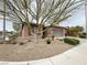 Charming single-story home with low-maintenance desert landscaping, and a two-car garage at 6946 Motley Rd, Las Vegas, NV 89178