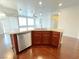 Kitchen island with granite countertops, stainless steel appliances, and wood cabinets at 6946 Motley Rd, Las Vegas, NV 89178
