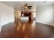 Inviting living area with hardwood floors and an open view to the kitchen at 6946 Motley Rd, Las Vegas, NV 89178