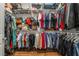 Walk-in closet with ample storage featuring built-in wire shelving, and rods for hanging clothing at 715 Orange Plume Walk, Henderson, NV 89011