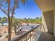 Balcony view showcasing lush greenery and city skyline, providing a relaxing outdoor space at 725 N Royal Crest Cir # 228, Las Vegas, NV 89169