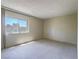 Bedroom featuring carpet and window at 725 N Royal Crest Cir # 228, Las Vegas, NV 89169
