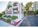 Gated Casablanca Condominium entrance with a well-maintained landscape at 725 N Royal Crest Cir # 228, Las Vegas, NV 89169