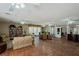 Spacious lounge area featuring tile floors, bookshelves, and seating at 725 N Royal Crest Cir # 228, Las Vegas, NV 89169