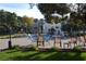 Community pool area with comfortable seating surrounded by green space at 725 N Royal Crest Cir # 228, Las Vegas, NV 89169