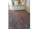 Large living room with plush carpeting, and kitchen access at 7290 Sheared Cliff Ln # 102, Las Vegas, NV 89149