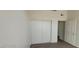Bedroom with vinyl floor, showing closet and door at 75 N Valle Verde Dr # 2121, Henderson, NV 89074