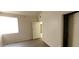 Bedroom with vinyl floor, white window, and white door at 75 N Valle Verde Dr # 2121, Henderson, NV 89074