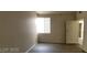 Bedroom with vinyl floor, white window, and white door at 75 N Valle Verde Dr # 2121, Henderson, NV 89074
