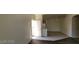Inviting living room featuring tile flooring and an open doorway at 75 N Valle Verde Dr # 2121, Henderson, NV 89074