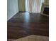 Spacious living room with hardwood floors, a fireplace, and sliding glass doors at 75 N Valle Verde Dr # 2121, Henderson, NV 89074