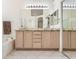 Bathroom featuring dual sinks, granite countertops, a bathtub, and shower with glass doors at 7515 Splashing Rock Dr, Las Vegas, NV 89131