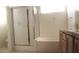 Bathroom features a shower and tub at 7515 Splashing Rock Dr, Las Vegas, NV 89131