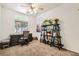 Bright bedroom with modern desk, decor, and large window at 7515 Splashing Rock Dr, Las Vegas, NV 89131