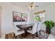 Bright dining room with modern table, stylish chairs, and ample natural light at 7515 Splashing Rock Dr, Las Vegas, NV 89131