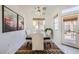 Bright dining area with lots of natural light, large farmhouse table, and neutral colors at 7515 Splashing Rock Dr, Las Vegas, NV 89131