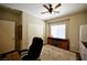 The bedroom has a ceiling fan and good natural light from the window at 7727 Widewing Dr, North Las Vegas, NV 89084