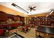 Bright and functional craft room equipped with tables, storage cabinets, a sink, and ample lighting at 7727 Widewing Dr, North Las Vegas, NV 89084