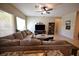 Comfortable living room featuring a sectional sofa, neutral tones, and inviting atmosphere at 7727 Widewing Dr, North Las Vegas, NV 89084