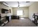 Cozy living room featuring a large table and modern comforts at 7727 Widewing Dr, North Las Vegas, NV 89084