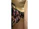 Well-organized walk-in closet featuring full-length hanging space at 7727 Widewing Dr, North Las Vegas, NV 89084