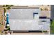 Aerial view of the roof showing the backyard pool featuring a rock waterfall slide, and desert landscaping at 8 Via Tiberina, Las Vegas, NV 89011