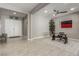 Inviting entryway featuring tile flooring and a dedicated home office space with natural light at 8 Via Tiberina, Las Vegas, NV 89011