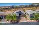 Charming single-Gathering home featuring desert landscaping, a brick driveway, and well-maintained curb appeal at 8 Via Tiberina, Las Vegas, NV 89011