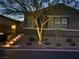 Inviting home exterior with landscaped yard and illuminated entryway steps at 8 Via Tiberina, Las Vegas, NV 89011