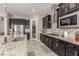 Well-equipped kitchen featuring a large island, stainless steel appliances, and ample counter space at 8 Via Tiberina, Las Vegas, NV 89011