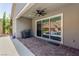 Covered patio featuring a ceiling fan, view of pool, and brick pavers at 8 Via Tiberina, Las Vegas, NV 89011