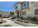 Charming home featuring low maintenance landscaping and inviting front entry at 8486 Insignia Ave # 101, Las Vegas, NV 89178