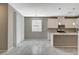 Modern kitchen with granite countertops, stainless steel appliances, and large windows at 8486 Insignia Ave # 101, Las Vegas, NV 89178