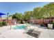Relaxing community spa with lounge chairs, creating a serene oasis for residents to unwind and rejuvenate at 8486 Insignia Ave # 101, Las Vegas, NV 89178