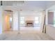 Spacious living room with fireplace ready for renovation at 8740 Captains Pl, Las Vegas, NV 89117