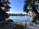 Picturesque waterfront view from the yard, with access to a private dock at 8740 Captains Pl, Las Vegas, NV 89117